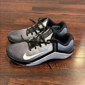 GUC Nike Metcon sneakers.